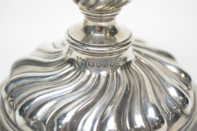Lot 235 - A pair of Victorian silver candlesticks