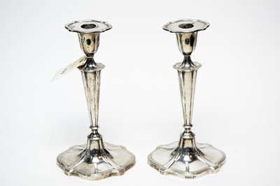 Lot 239 - A pair of Edwardian silver candlesticks, by Walker & Hall