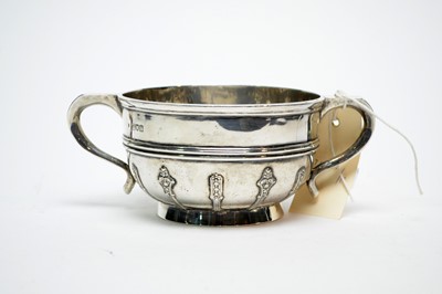 Lot 234 - An Edwardian twin-handled silver bowl