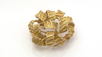 Lot 654 - An 18ct yellow gold 1970s brooch, by CJLd