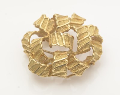 Lot 654 - An 18ct yellow gold 1970s brooch, by CJLd