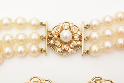 Lot 656 - A demi-parure of diamond and cultured-pearl jewellery