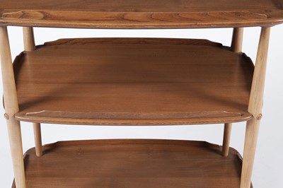 Lot 82 - Lucian Ercolani for Ercol - Model no 458: An elm three-tier drinks trolley