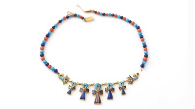 Lot 780 - An Egyptian yellow gold, coral, turquoise and lapis lazuli necklace