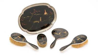 Lot 35 - A George V silver mounted and enamel dressing table set