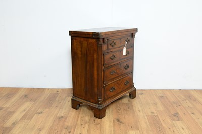 Lot 49 - A late 19th Century early 20th Century walnut and burr walnut banded chest of drawers