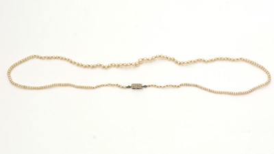 Lot 154 - A single-strand seed pearl necklace with diamond clasp
