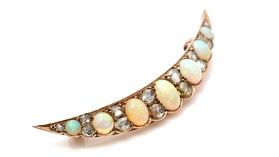 Lot 783 - A Victorian opal and diamond crescent brooch