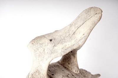 Lot 902 - An Inuit whalebone style vertebrae carving