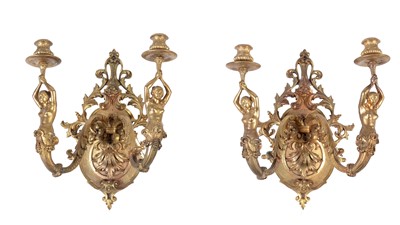 Lot 1296 - A pair of gilt bronze wall lights