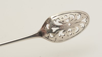 Lot 1594 - A rare George II miniature silver mote spoon