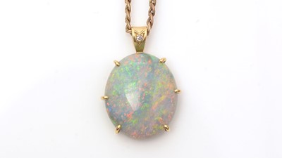 Lot 646 - An opal and diamond pendant
