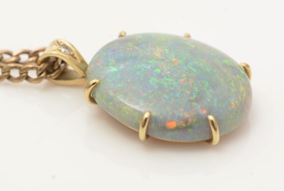Lot 646 - An opal and diamond pendant