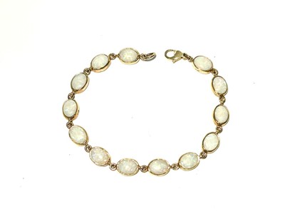 Lot 186 - An opal and 9ct yellow gold bracelet