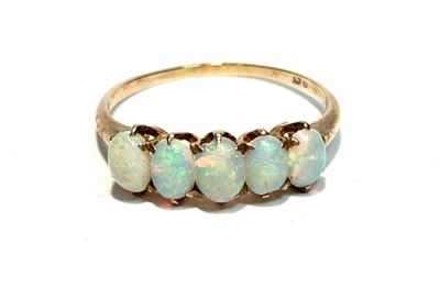 Lot 179 - Five stone opal ring