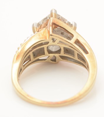 Lot 1075 - A diamond dress ring