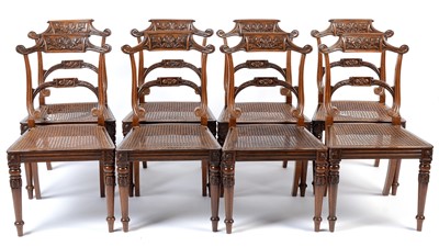 Lot 1494 - A set of eight late Regency carved rosewood dining chairs