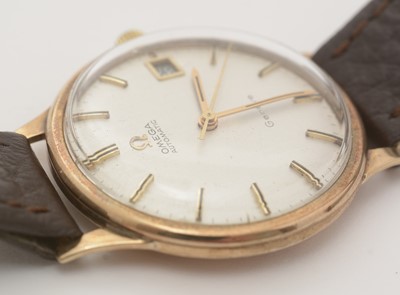 Lot 558 - Omega Geneve: a 9ct yellow gold cased automatic wristwatch