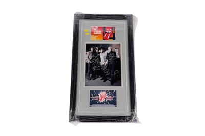 Lot 749 - A signed and framed Rolling Stones photograph