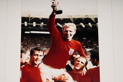 Lot 753 - A framed Bobby Moore autograph and photograph