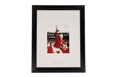 Lot 753 - A framed Bobby Moore autograph and photograph