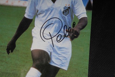 Lot 754 - An autographed photograph of Pelé