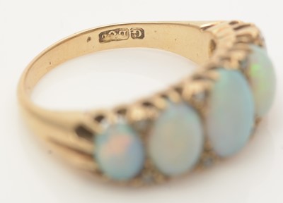 Lot 788 - An early 20th Century five stone opal ring