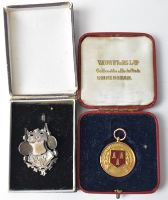 Lot 254 - Two football medals
