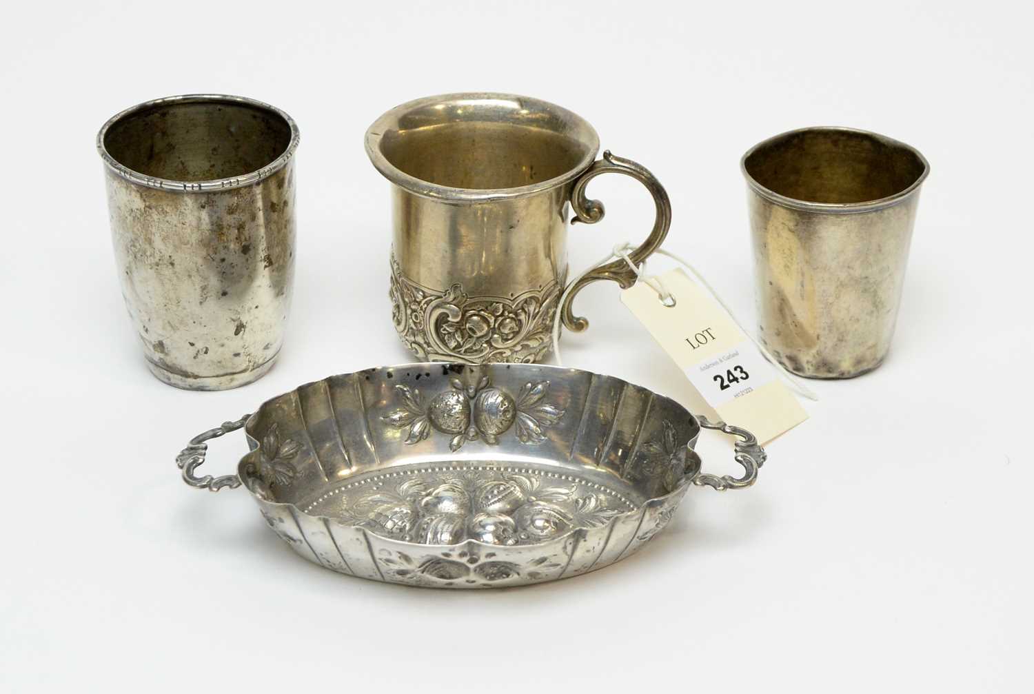 Lot 243 - An Edwardian silver Christening cup; a bonbon dish and two tumblers