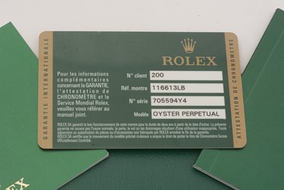 Lot 588 - Rolex Oyster Perpetual Date Submariner: a steel and gold cased automatic wristwatch