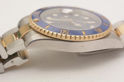 Lot 588 - Rolex Oyster Perpetual Date Submariner: a steel and gold cased automatic wristwatch