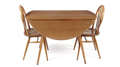 Lot 6 - Lucian Ercolani for Ercol: A drop leaf  table, model 284, and two chairs, Model 400.