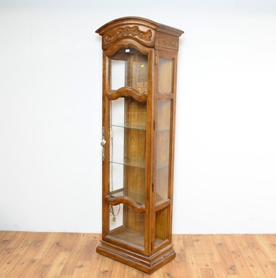 Lot 44 - A French provincial oak display cabinet of narrow form