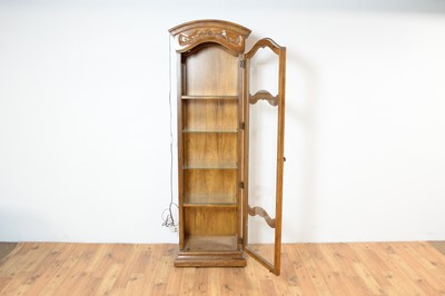 Lot 44 - A French provincial oak display cabinet of narrow form