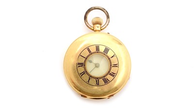 Lot 581 - An 18ct yellow gold cased half-hunter fob watch