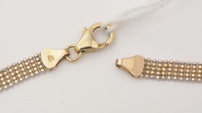 Lot 114 - An Italian bi-colour fancy link gold necklace