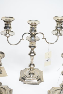 Lot 227 - A silver candelabrum and candlesticks, by Barker Ellis Silver Co