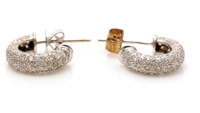 Lot 798 - A pair of diamond earrings