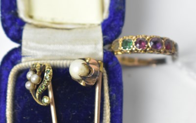 Lot 221 - A Victorian gold 'Regard' ring and two tie pins