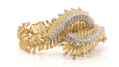Lot 808 - A fine gold and diamond bracelet