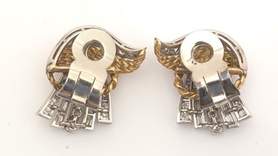Lot 809 - A gold and diamond brooch and matching earrings