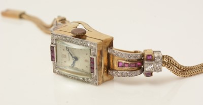 Lot 590 - Tarema: an Art Deco ruby and diamond set manual wind cocktail watch