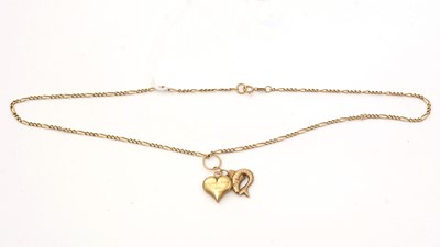 Lot 111 - A 9ct yellow gold chain necklace with two pendants