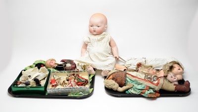 Lot 387 - A collection of antique dolls, doll parts and accessories