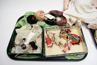 Lot 387 - A collection of antique dolls, doll parts and accessories