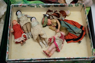 Lot 387 - A collection of antique dolls, doll parts and accessories
