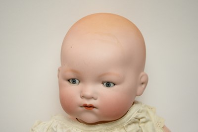 Lot 387 - A collection of antique dolls, doll parts and accessories