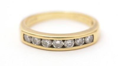 Lot 511 - A diamond half eternity ring