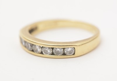 Lot 176 - A diamond half eternity ring
