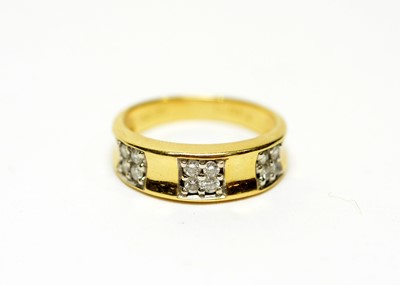 Lot 512 - A diamond and yellow gold half-hoop ring